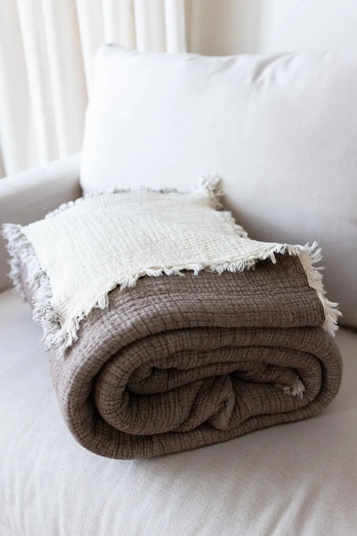 Dark Brown handwoven 8-layer muslin Turkish cotton quilt close up. Hand-tied fringe Denizli, OEKO-TEX. Vivamaison.