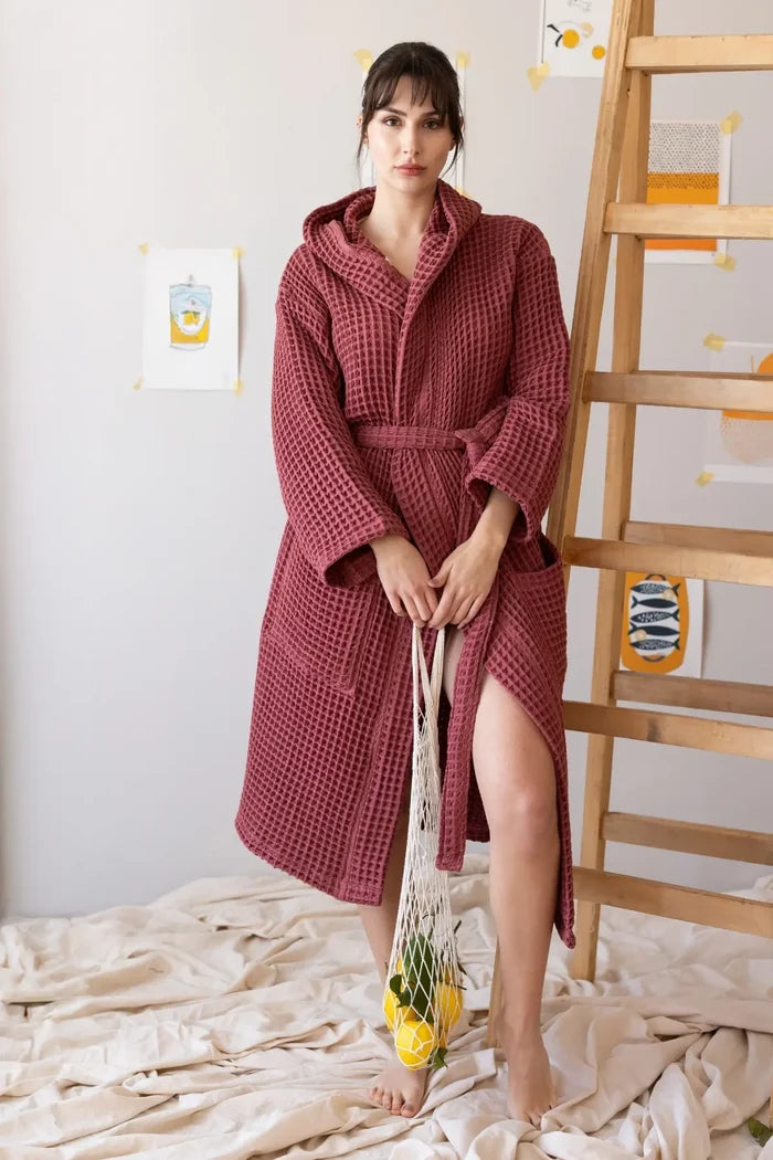 Dark red waffle hooded bathrobe front full view, spa lifestyle. Handwoven Turkish cotton Denizli, OEKO-TEX. Vivamaison.