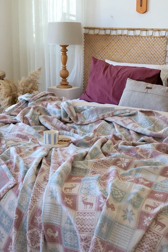 Christmas handwoven 3-layer patterned muslin Turkish cotton bedspread folded flat lay. Woven patterns, Denizli, OEKO-TEX. Viv
